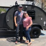 Bean Customers posing by their new trailer