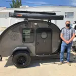 Owner(s) standing next to their Bean Trailer