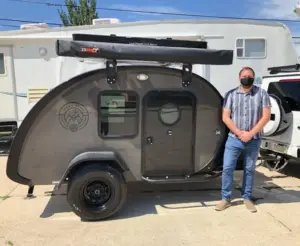 Owner(s) standing next to their Bean Trailer