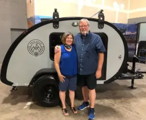 Owner(s) standing next to their Bean Trailer