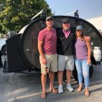 Owner(s) standing next to their Bean Trailer