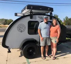 Bean Customers posing by their new trailer