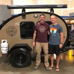 Bean Customers posing by their new trailer