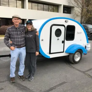 Bean Customers posing by their new trailer