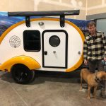 Owner(s) standing next to their Bean Trailer