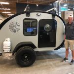 Owner(s) standing next to their Bean Trailer