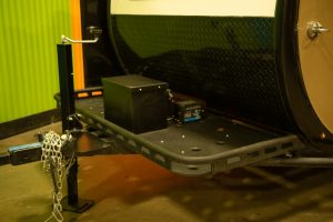 All of our teardrop trailers come with a front storage bin. This is where your electrical power is housed.