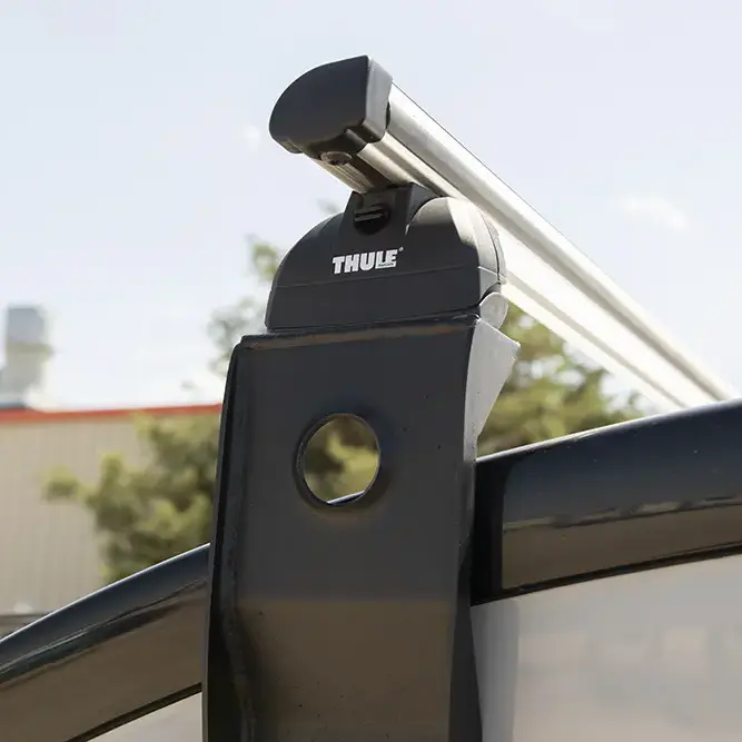 Roof rack system with side mounted brackets.