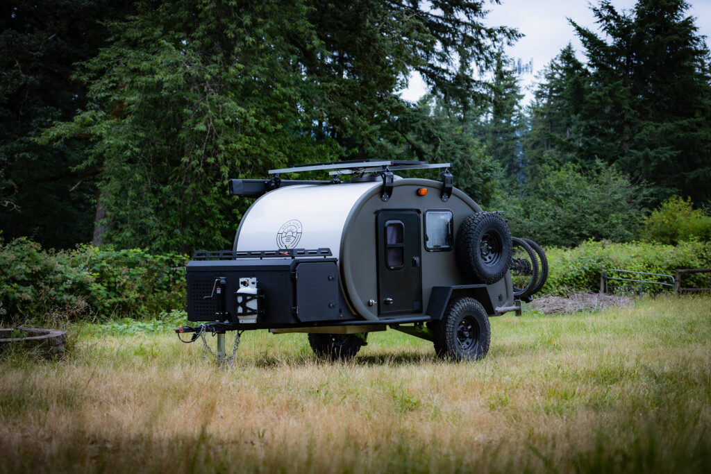 Bean Stock X parked in a forest meadow