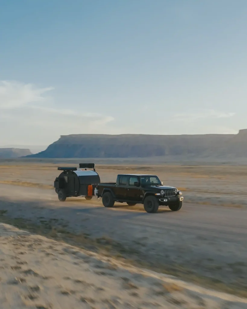 Black Bean towed across a desert flat