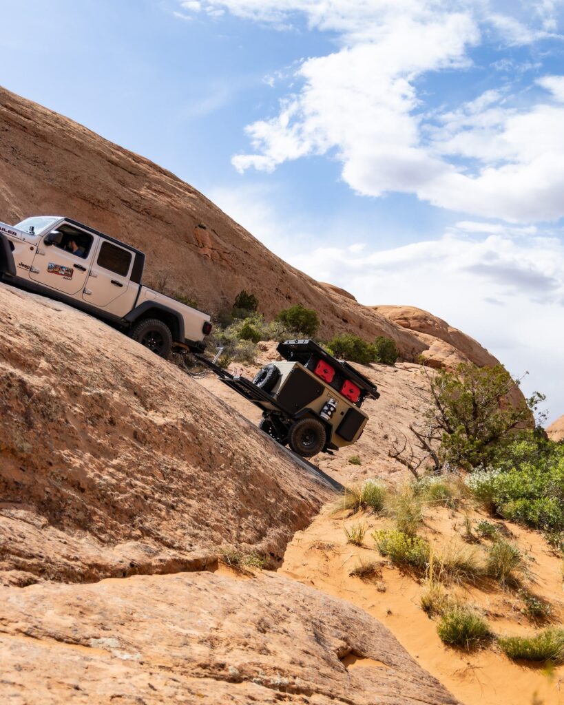 Bean Pod towed up a slickrock slope