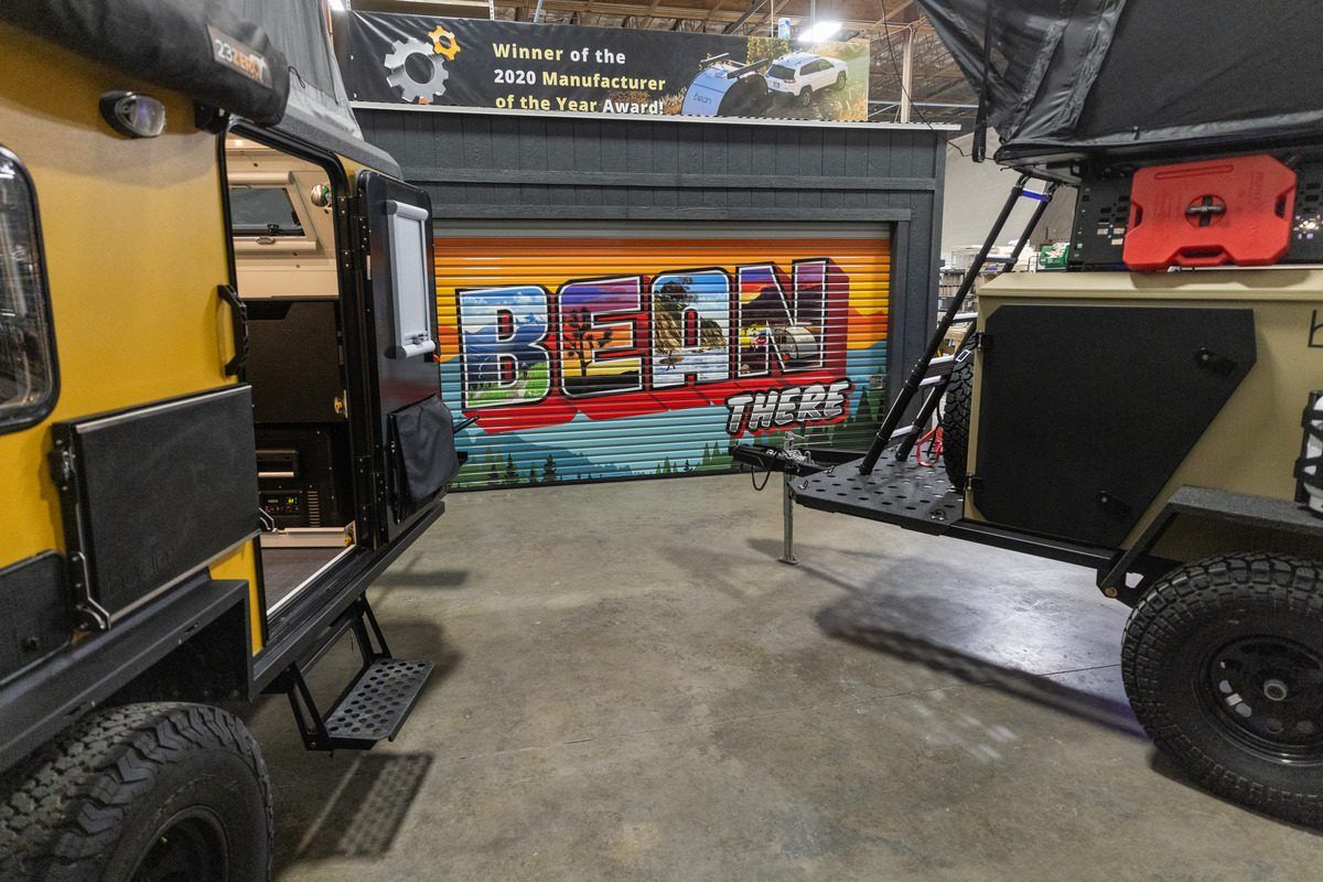 Bean trailers inside the Bean building beneath a banner reading Winner of the 2020 Manufacturer of the Year Award